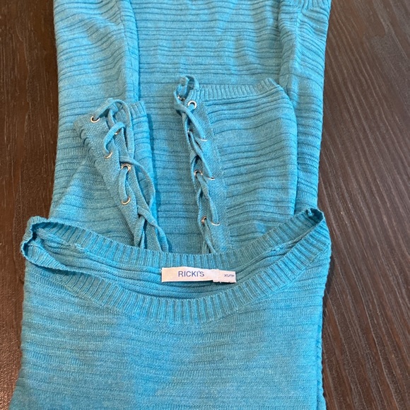 Ricki’s teal blue light sweater in size extra small. - Picture 9 of 9
